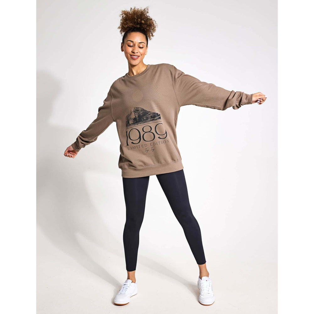 TayTay, Tay Tay 1989 Limited Edition Sweatshirt, 1989 Limited Edition Sweatshirt for the ultimate Swiftie. Models Height: 5'8" Model is wearing: Medium Material: 80% ringspun cotton/20% polyester. Drop shoulder style. Stylish fit. Soft cotton faced fabric