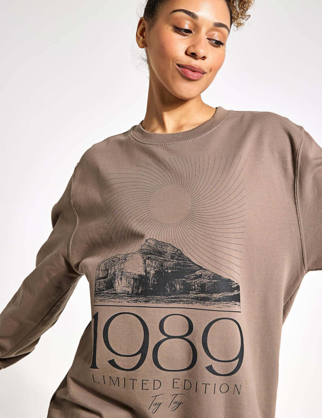 TayTay, Tay Tay 1989 Limited Edition Sweatshirt, 1989 Limited Edition Sweatshirt for the ultimate Swiftie. Models Height: 5'8" Model is wearing: Medium Material: 80% ringspun cotton/20% polyester. Drop shoulder style. Stylish fit. Soft cotton faced fabric